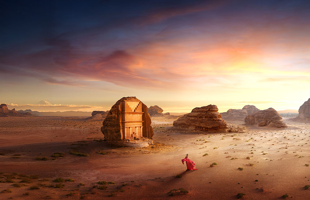 Woman walking in the AlUla desert in a magic shot